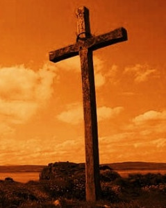 Picture of a wooden Christian cross on Saint Cuthberts Isle, Holy Island, Northumberland. St Cuthberts Isle was a small island used as a retreat by both Aidan and Cuthbert.